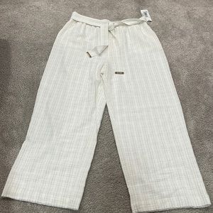 Calvin Klein cream gold stripe pant.